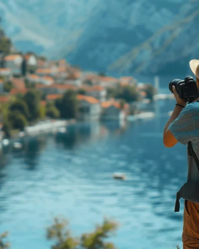 A man taking a photo of an abandoned city from a distance