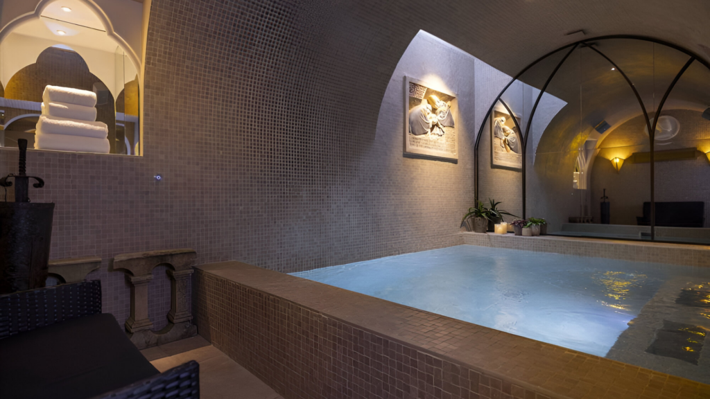 An expansive indoor pool in a hotel in Paris