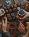 A couple enjoying a chocolate and beer pairing session