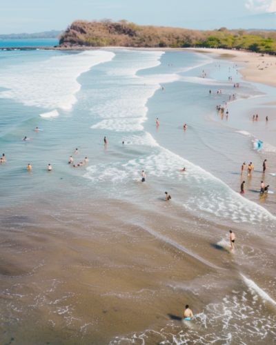 People swimming in Tamarindo Beach