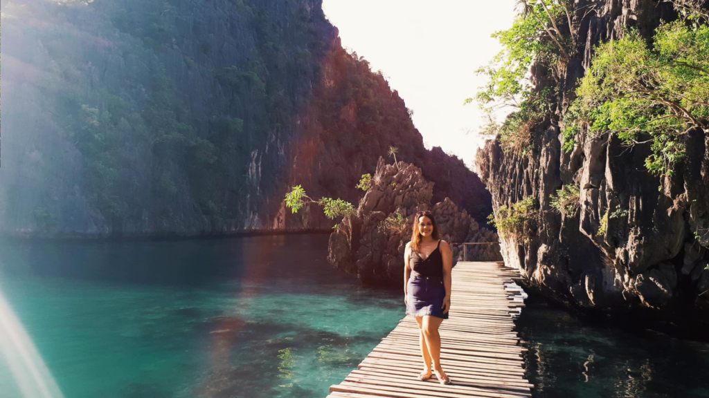 The turquoise waters and soft white sands of a beach in Camiguin Island, Philippines
